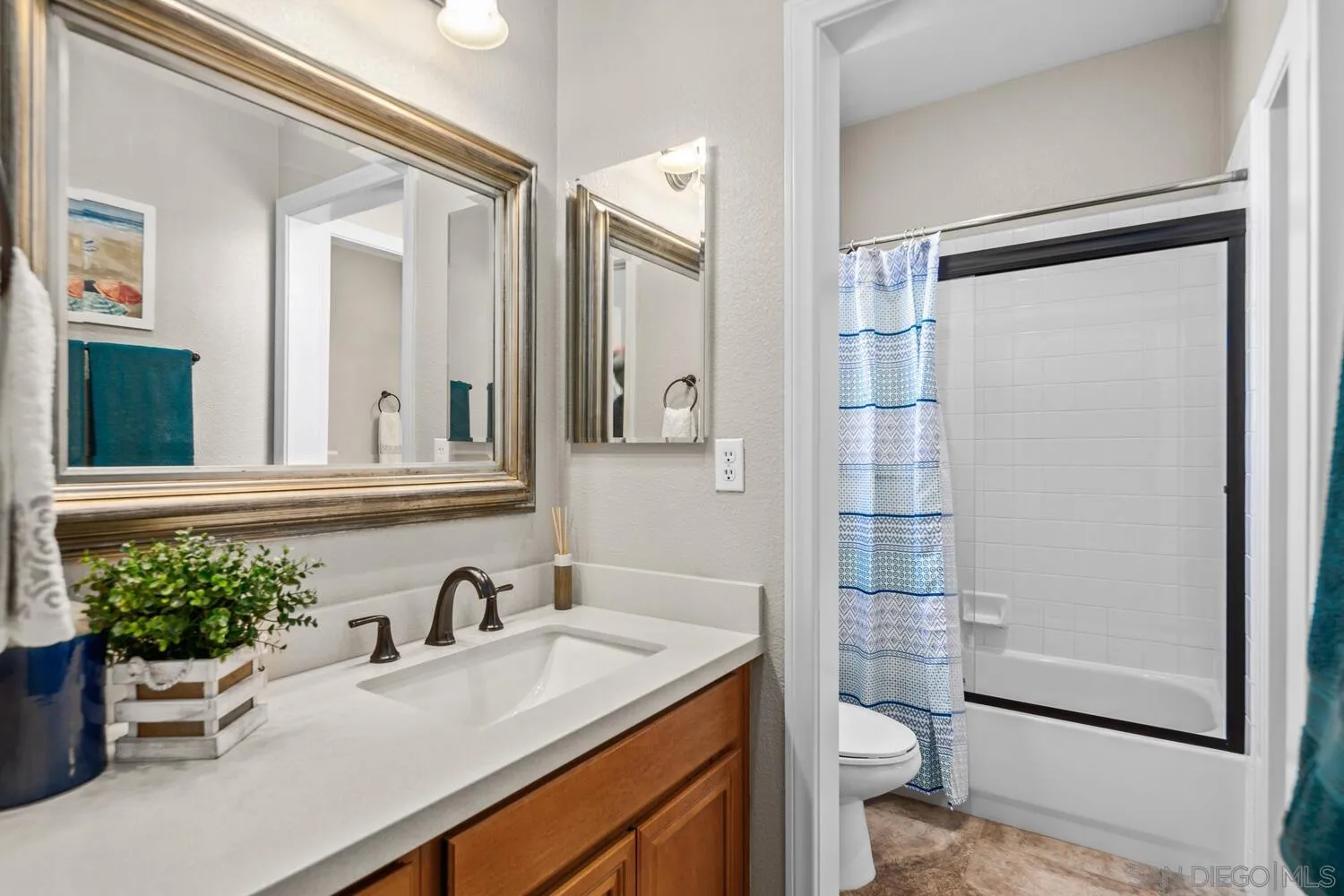 16327 Pinto Ridge Drive 4S Ranch, CA 92127 - Photo 46 of 74 a bathroom with a sink toilet and shower