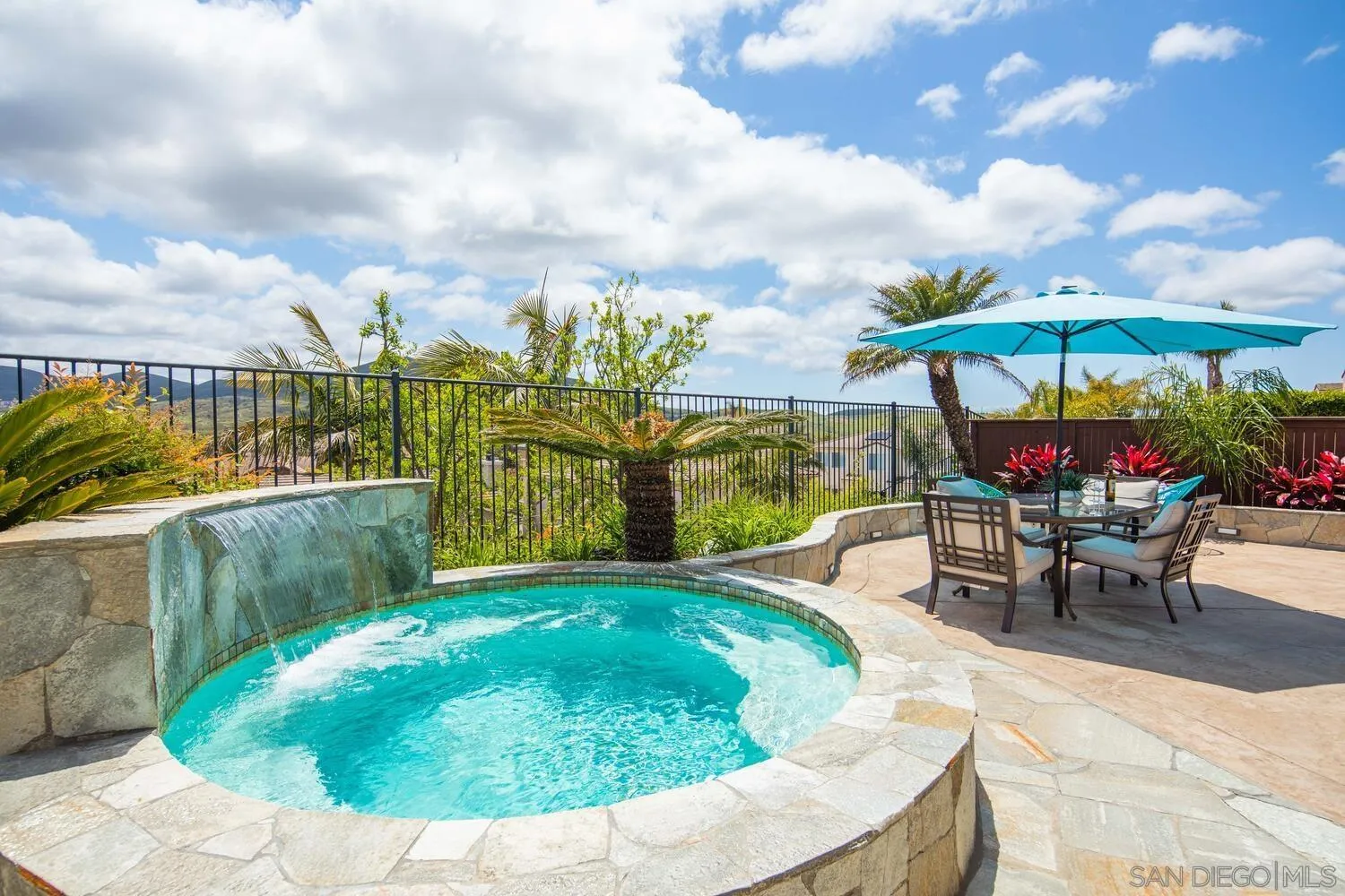 16327 Pinto Ridge Drive 4S Ranch, CA 92127 - Photo 62 of 74 a view of a swimming pool with a patio and a fire pit