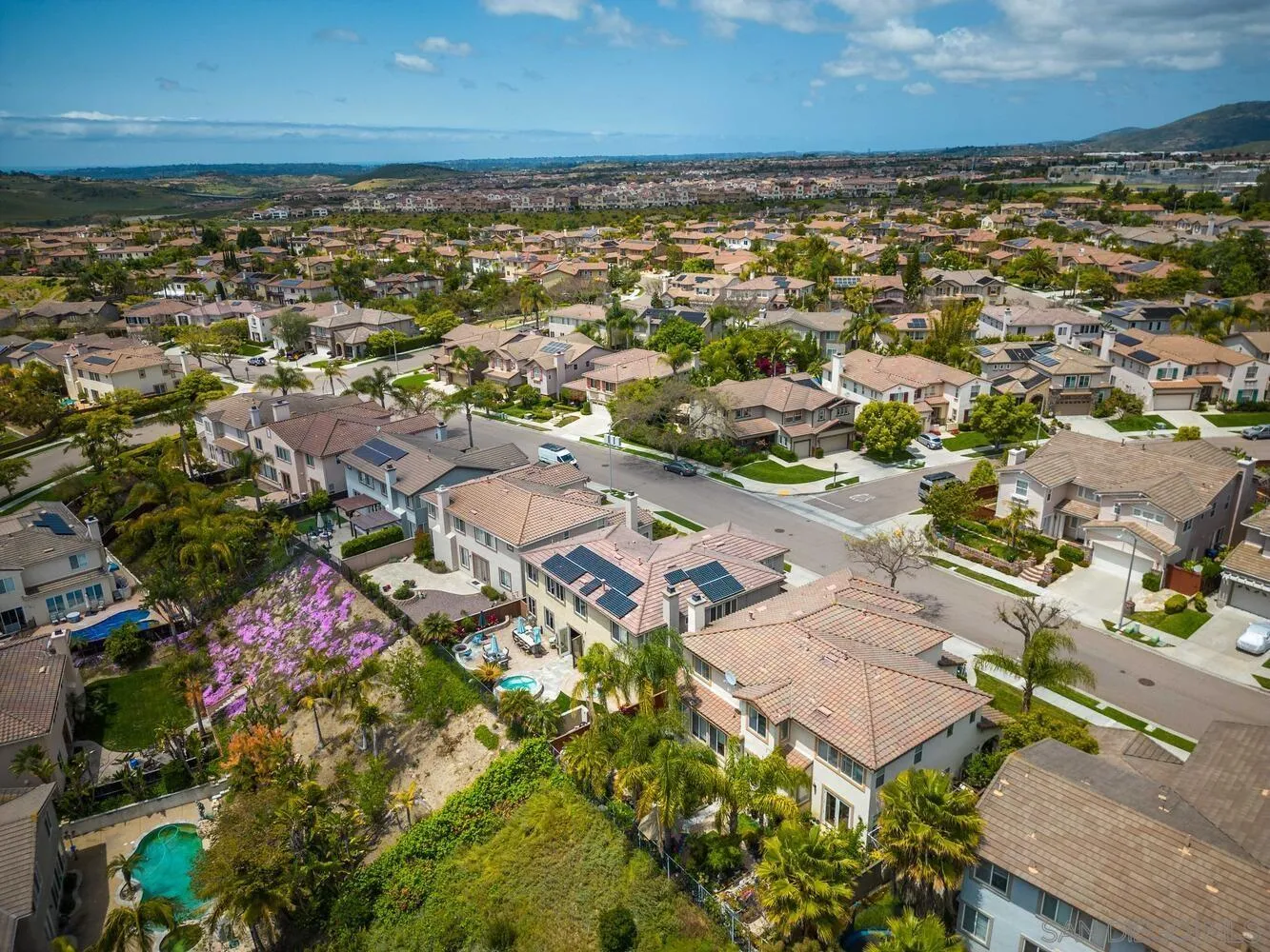 16327 Pinto Ridge Drive 4S Ranch, CA 92127 - Photo 69 of 74 an aerial view of residential building and lake