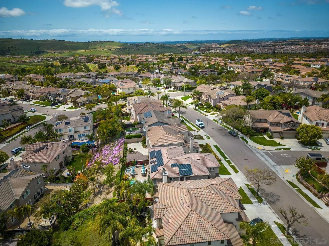 16327 Pinto Ridge Drive 4S Ranch, CA 92127 - Photo 70 of 74 an aerial view of residential building and ocean