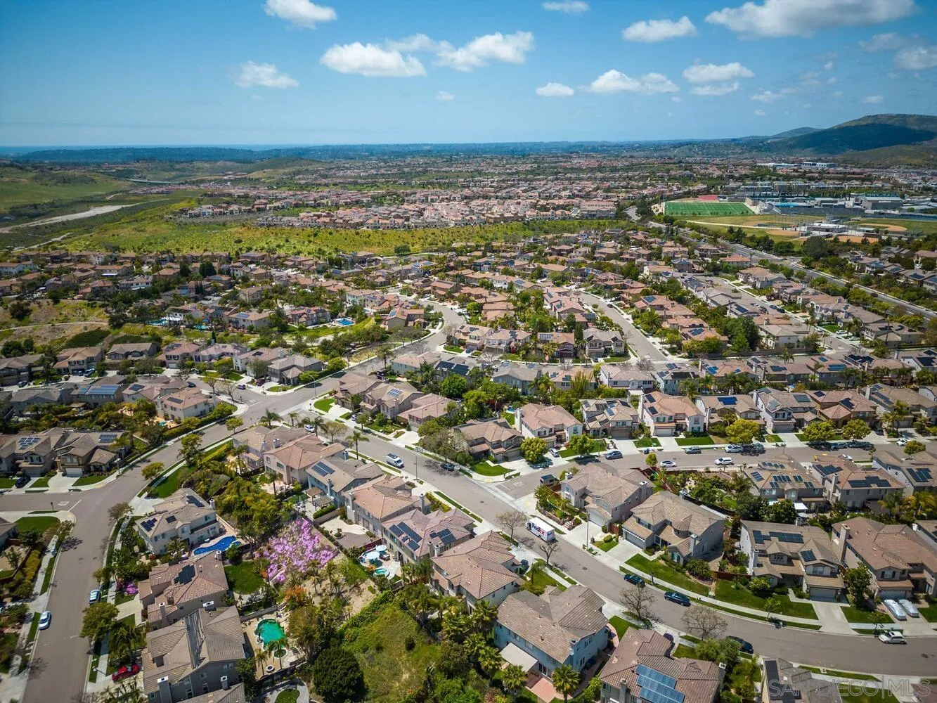 16327 Pinto Ridge Drive 4S Ranch, CA 92127 - Photo 73 of 74 an aerial view of residential building and ocean