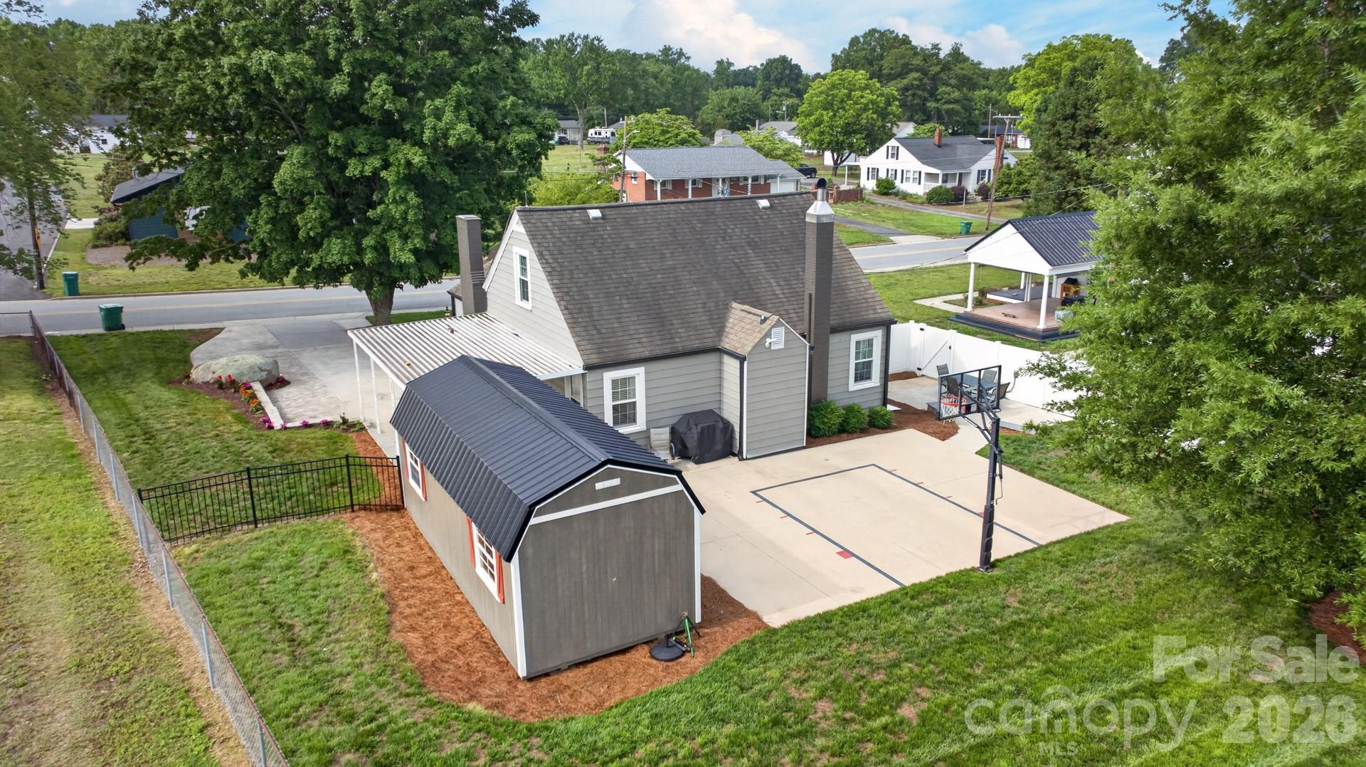 1016 Raney Street Salisbury, NC 28146 - Photo 35 of 45 an aerial view of a house with garden space and street view