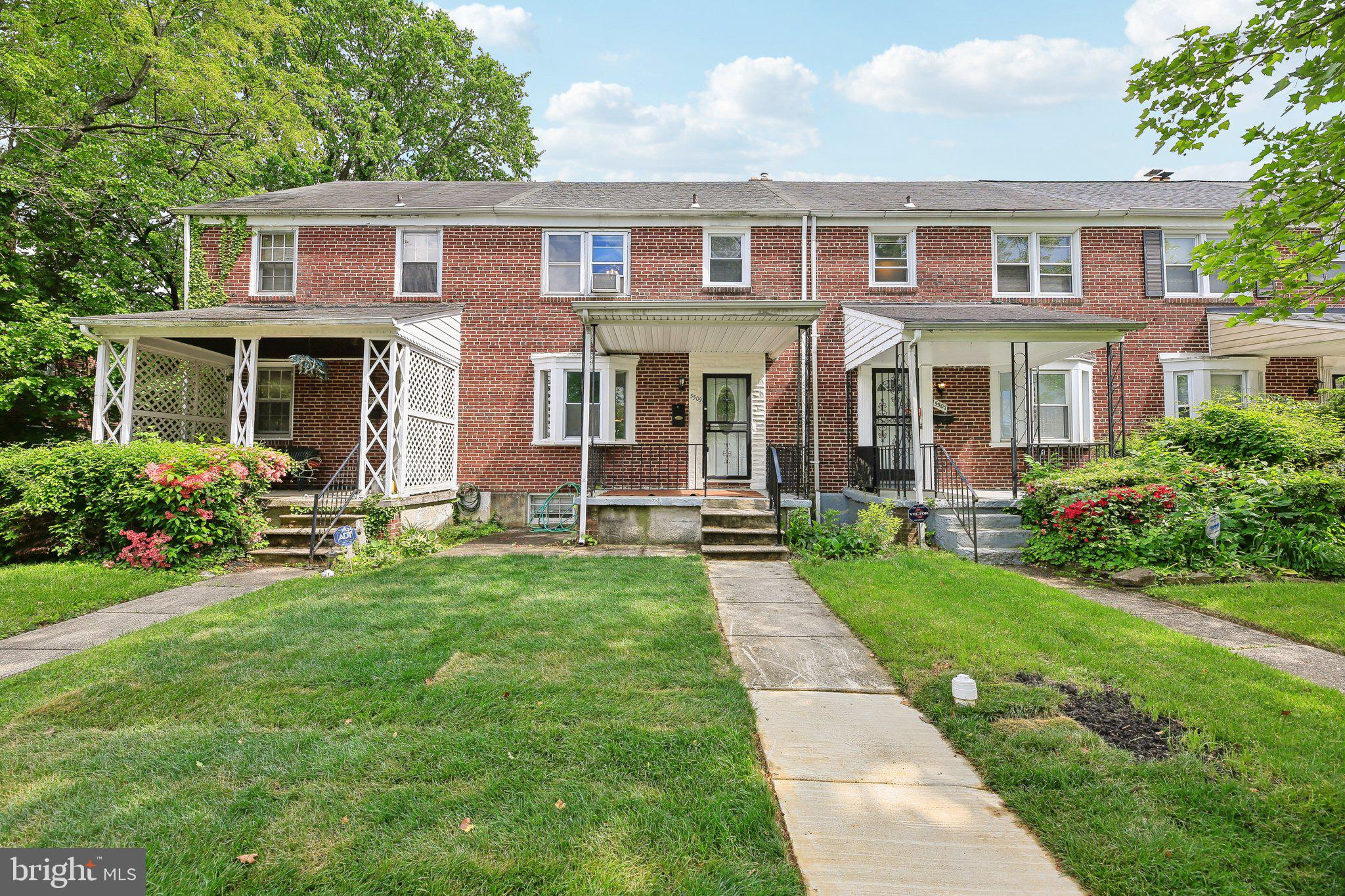 5509 Lothian Road Baltimore, MD 21212 - Photo 1 of 31 a front view of a house with a yard