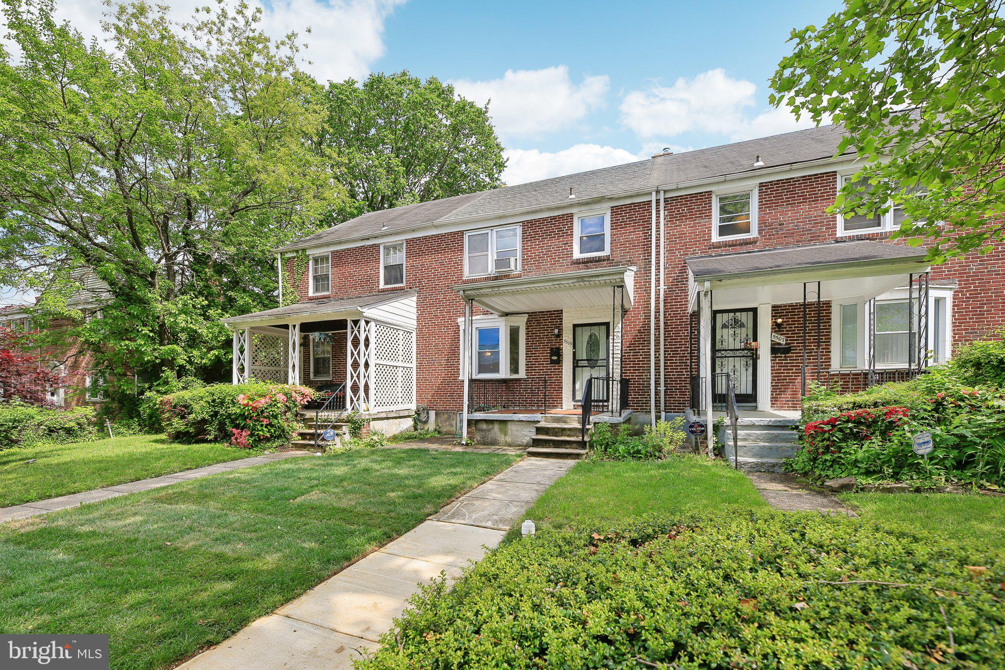 5509 Lothian Road Baltimore, MD 21212 - Photo 2 of 31 a front view of a house with a yard