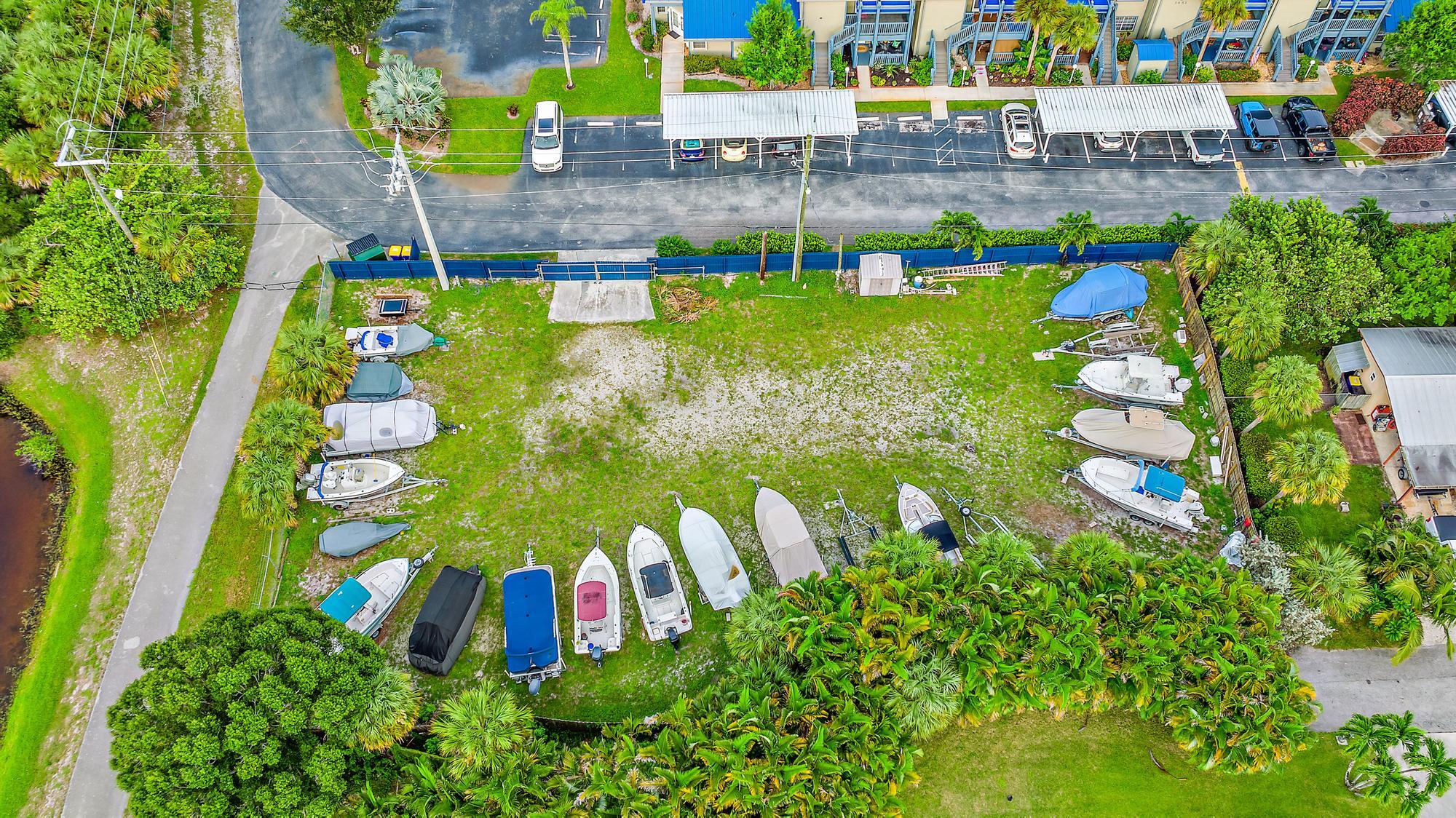 1561 Northeast 12th Terrace, Unit C14 Jensen Beach, FL 34957 - Photo 27 of 27 a view of a bunch of flowers