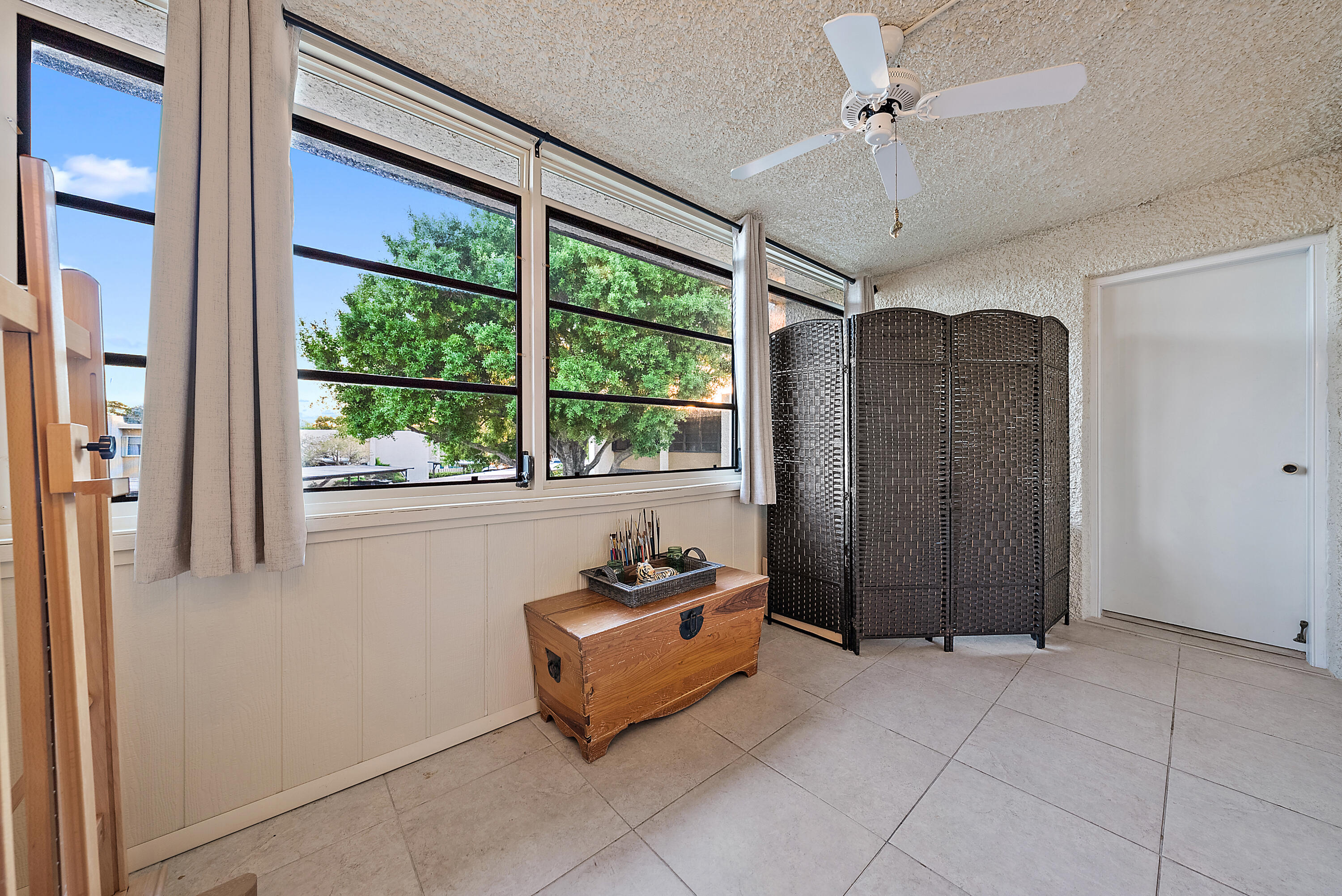 1561 Northeast 12th Terrace, Unit C14 Jensen Beach, FL 34957 - Photo 10 of 27 a view of entryway with furniture and a window