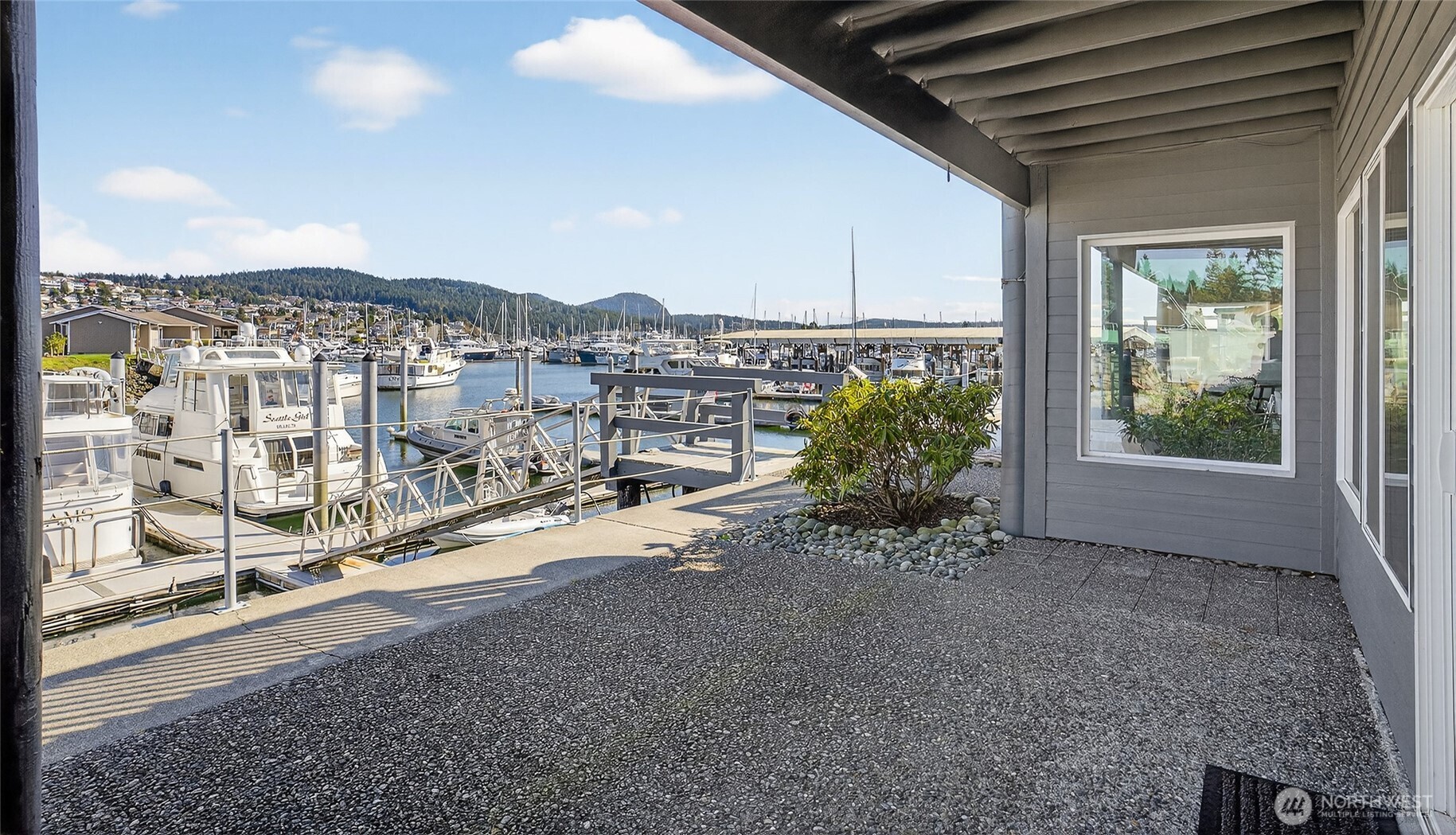 2001 Skyline Way, Unit 103 Anacortes, WA 98221 - Photo 22 of 39 a view of a terrace with wooden floor and city view