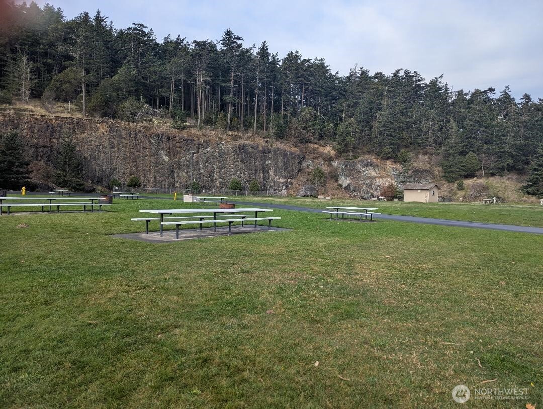 2001 Skyline Way, Unit 103 Anacortes, WA 98221 - Photo 37 of 39 a view of a golf course with a lake