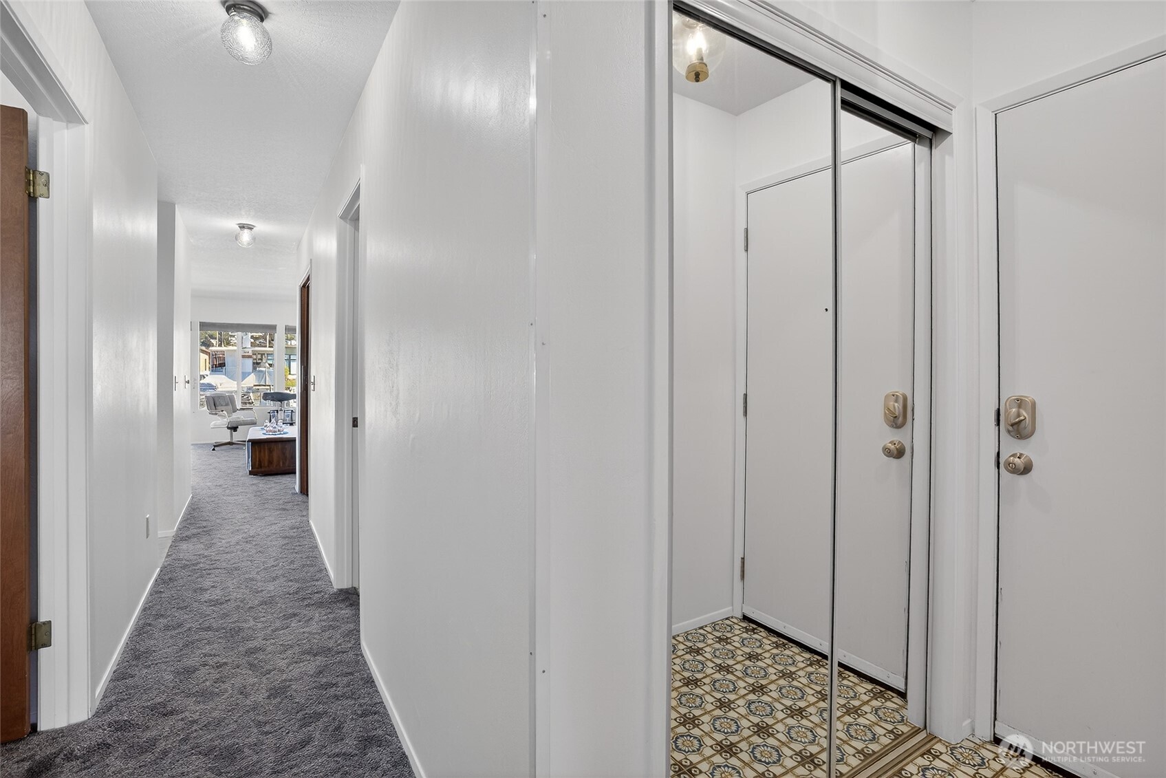 2001 Skyline Way, Unit 103 Anacortes, WA 98221 - Photo 8 of 39 a view of a hallway with a elevator