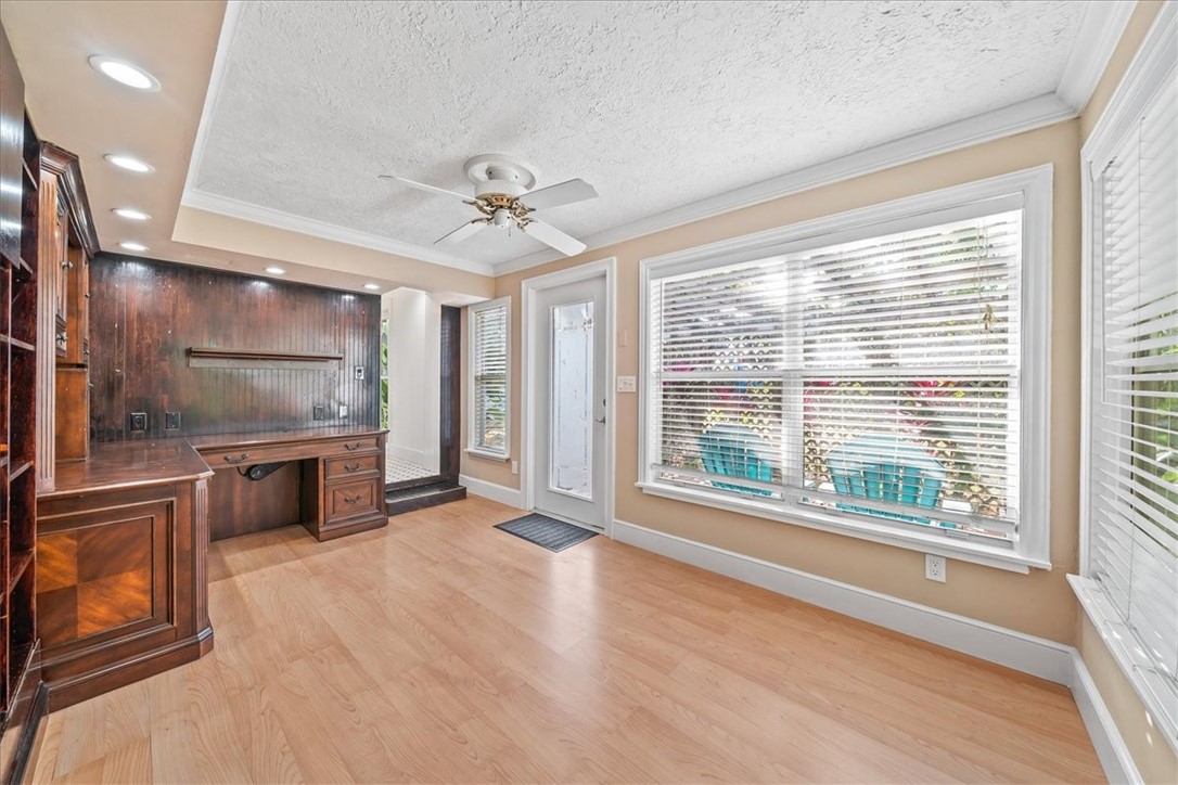 9670 Mockingbird Lane Sebastian, FL 32976 - Photo 17 of 36 a view of an empty room with a kitchen