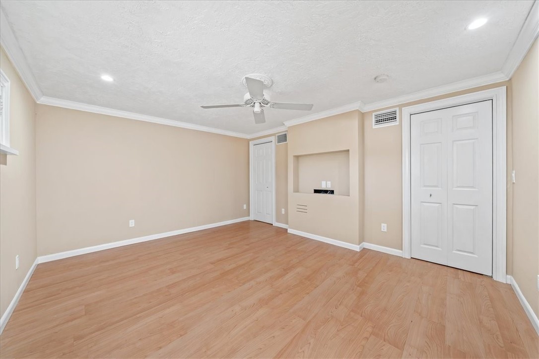 9670 Mockingbird Lane Sebastian, FL 32976 - Photo 18 of 36 wooden floor in an empty room with a window