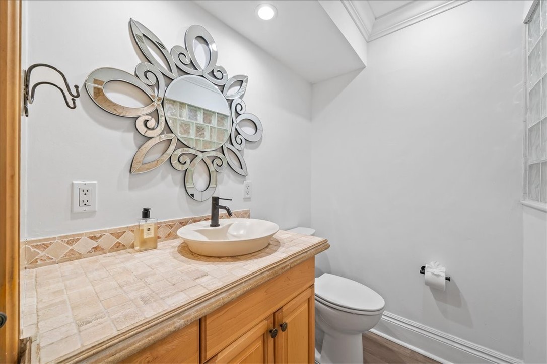 9670 Mockingbird Lane Sebastian, FL 32976 - Photo 19 of 36 a bathroom with a sink and a mirror