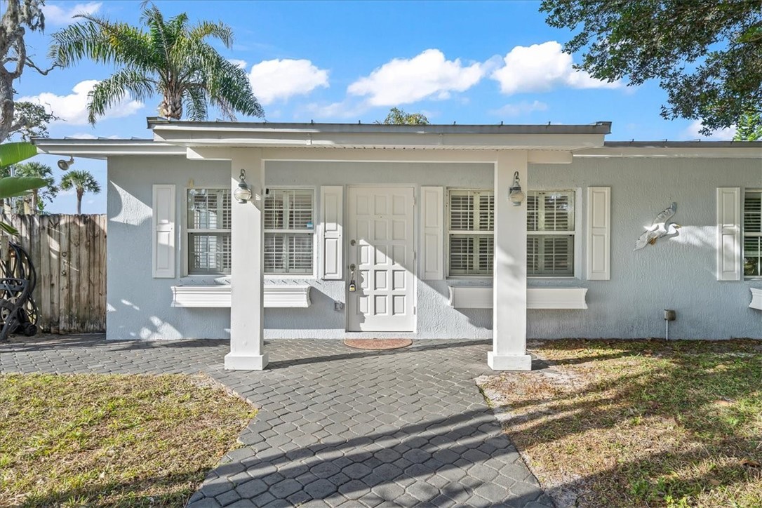9670 Mockingbird Lane Sebastian, FL 32976 - Photo 2 of 36 a front view of a house