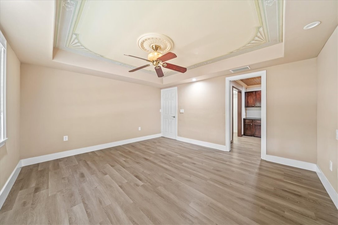9670 Mockingbird Lane Sebastian, FL 32976 - Photo 21 of 36 wooden floor in an empty room