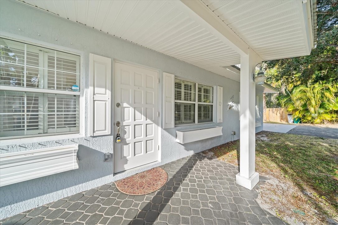 9670 Mockingbird Lane Sebastian, FL 32976 - Photo 3 of 36 a view of front door
