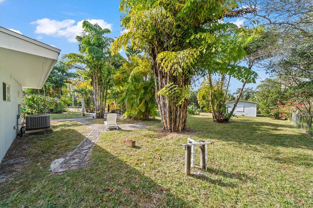 9670 Mockingbird Lane Sebastian, FL 32976 - Photo 32 of 36 a view of yard with tree