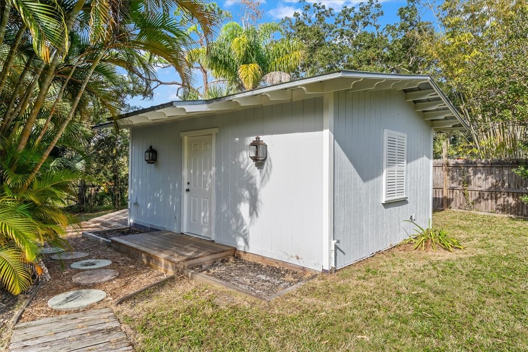 9670 Mockingbird Lane Sebastian, FL 32976 - Photo 33 of 36 a house with a outdoor space