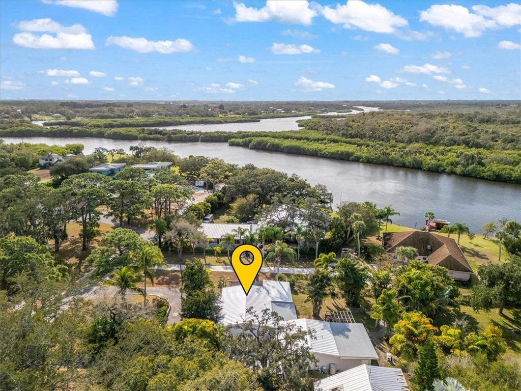 9670 Mockingbird Lane Sebastian, FL 32976 - Photo 36 of 36 a view of a lake