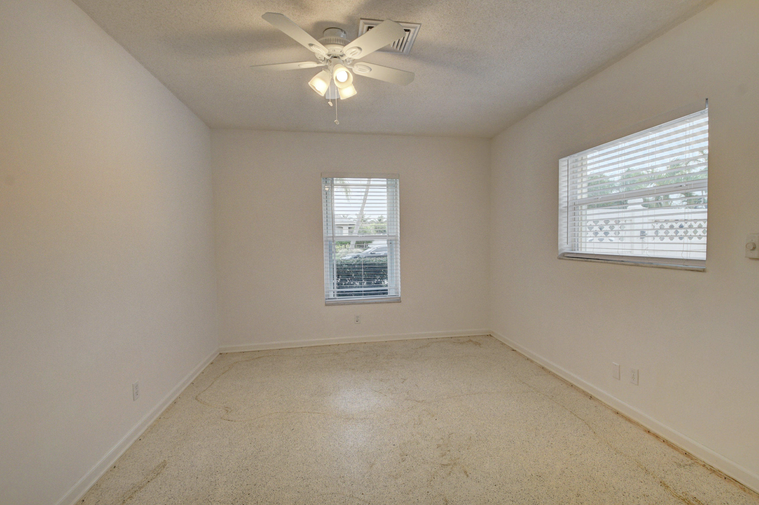 984 Southwest 3rd Street Boca Raton, FL 33486 - Photo 18 of 36 an empty room with a window