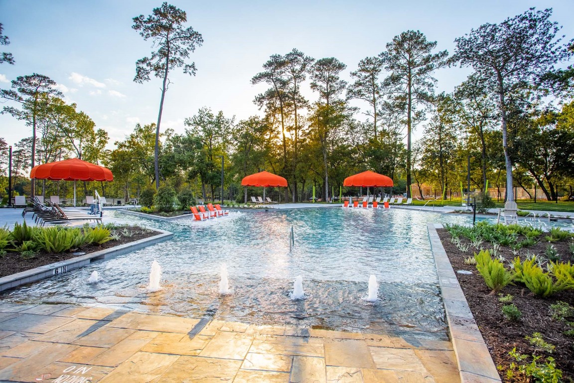 295 Sierra Stream Lane Conroe, TX 77304 - Photo 14 of 16 a view of a street with an outdoor space