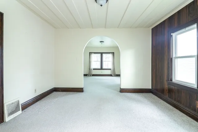 an empty room with windows