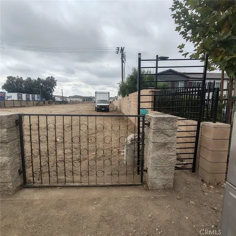 a view of a fence and a bench