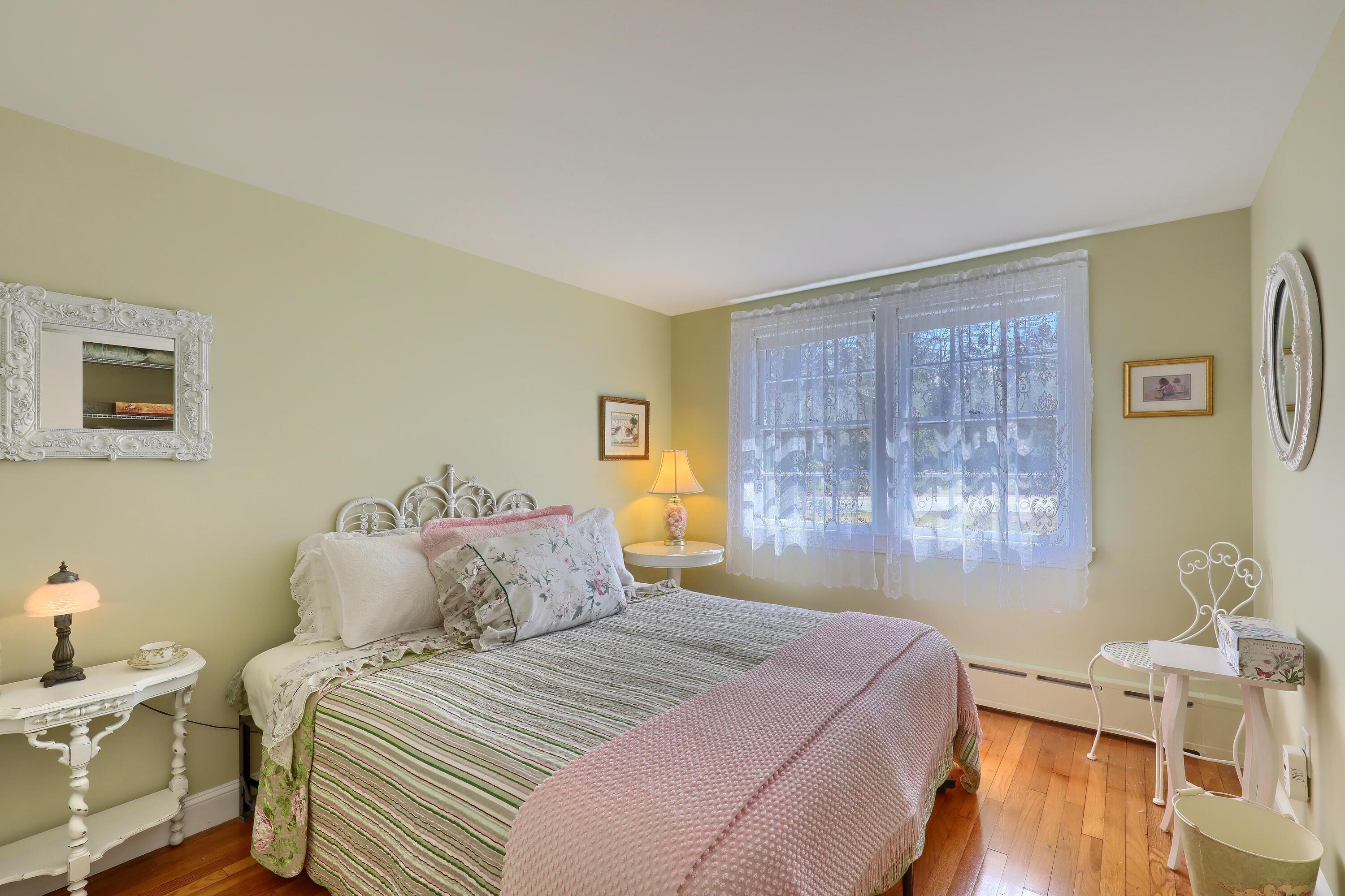 177 Old Stage Road Centerville, MA 02632 - Photo 19 of 29 a bedroom with a bed and a window