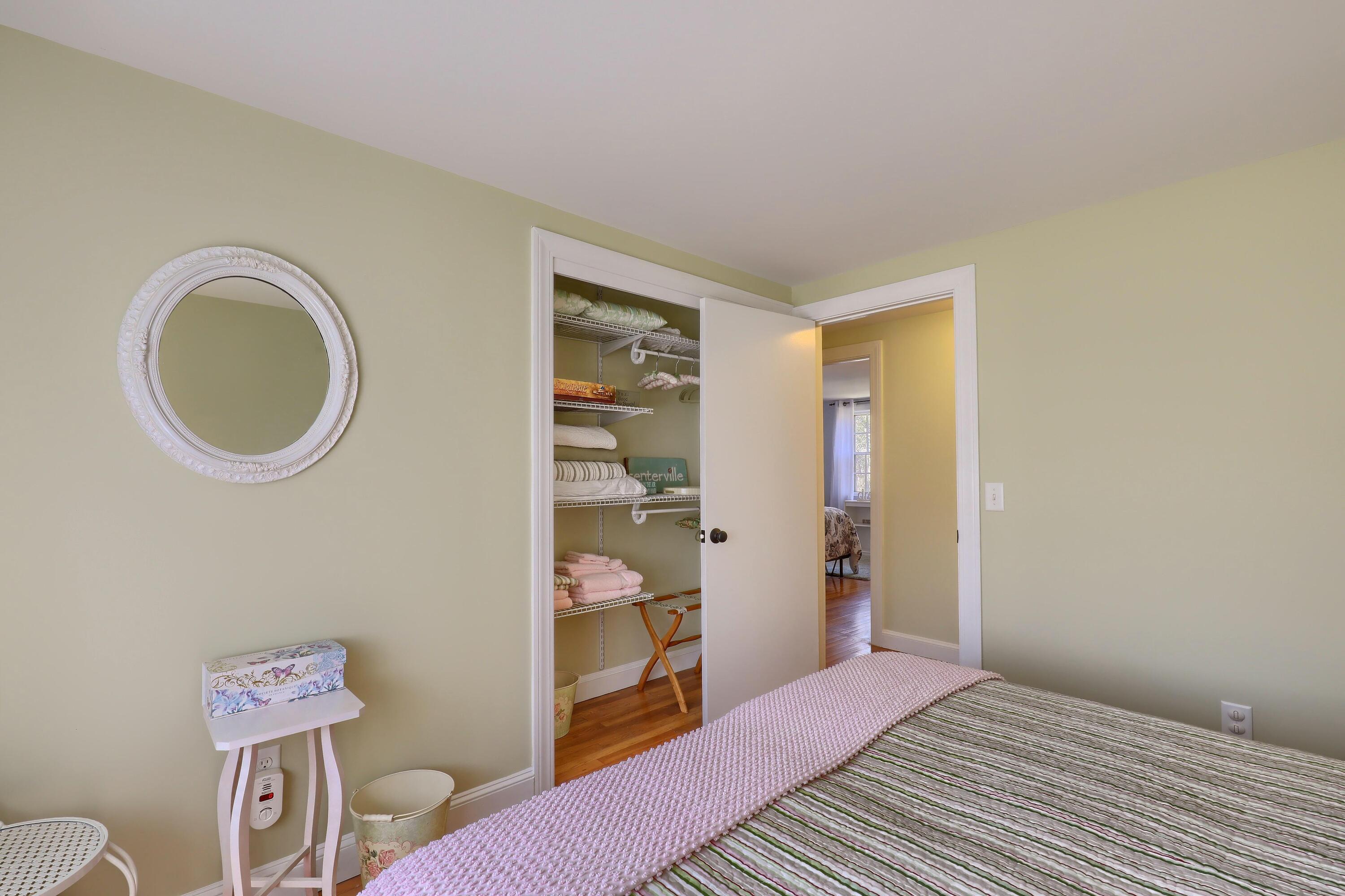 177 Old Stage Road Centerville, MA 02632 - Photo 20 of 29 a bedroom with a bed and a closet