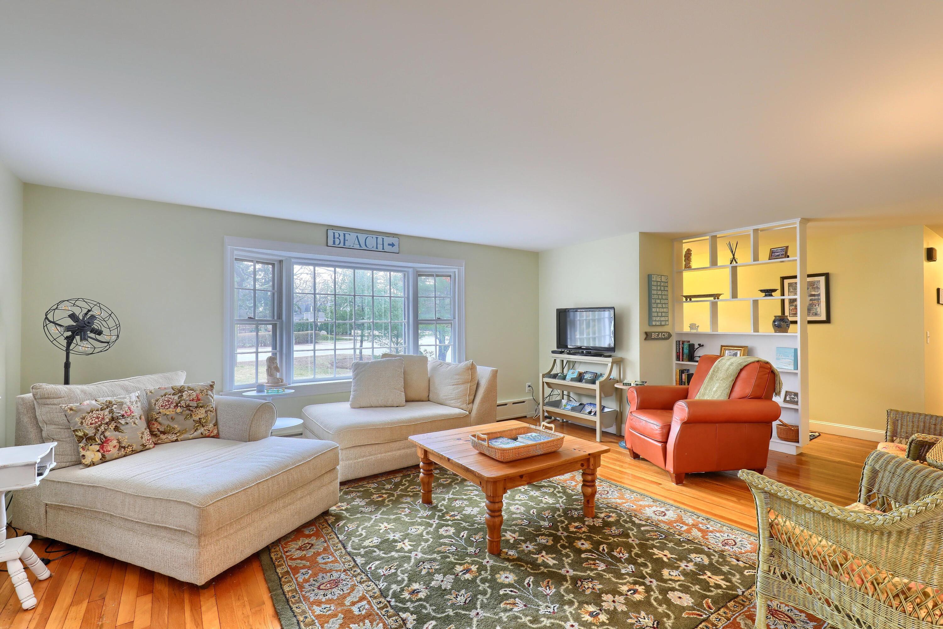 177 Old Stage Road Centerville, MA 02632 - Photo 6 of 29 a living room with furniture and a large window
