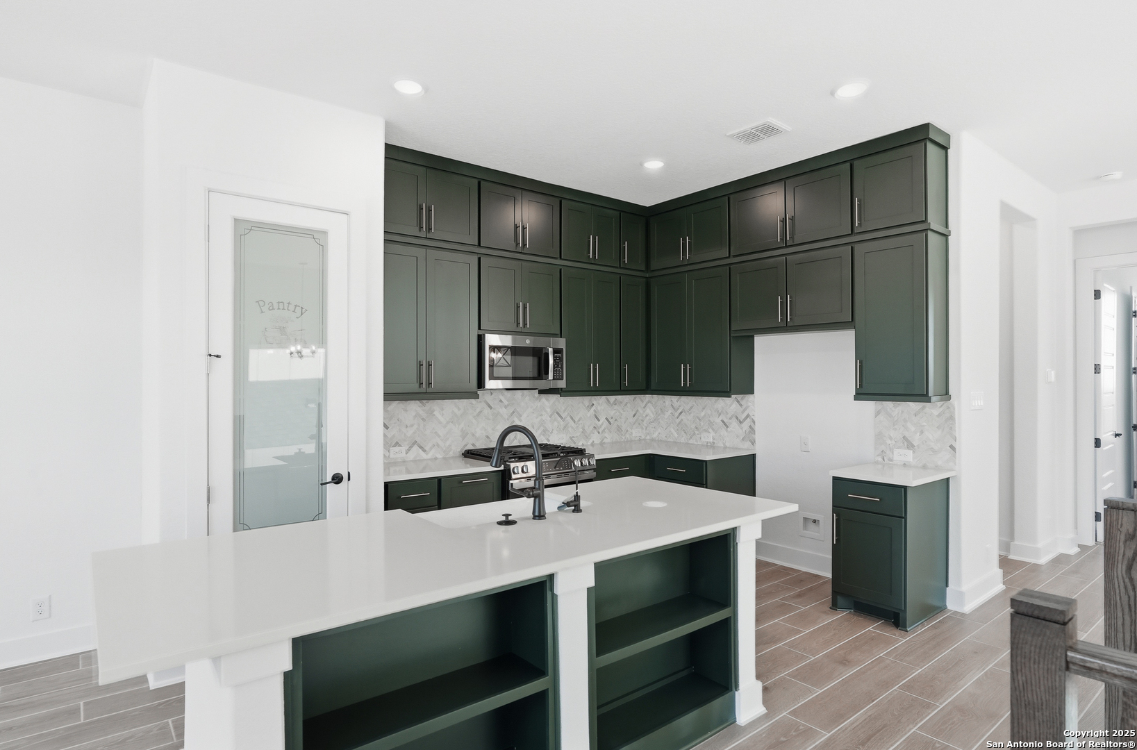 20675 Huebner Road, Unit 526 San Antonio, TX 78258 - Photo 11 of 45 a bathroom with a sink and a mirror
