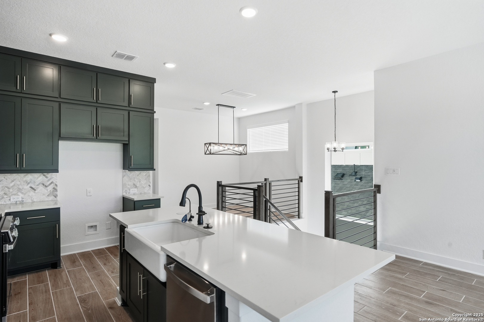 20675 Huebner Road, Unit 526 San Antonio, TX 78258 - Photo 12 of 45 a kitchen with kitchen island a sink appliances and cabinets