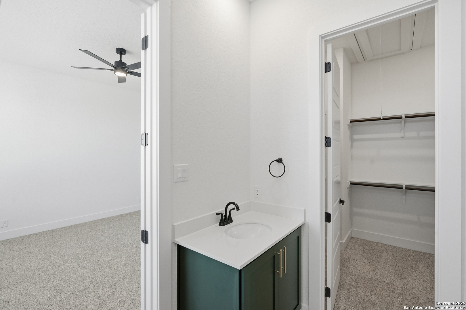 20675 Huebner Road, Unit 526 San Antonio, TX 78258 - Photo 25 of 45 a bathroom with a sink and a mirror