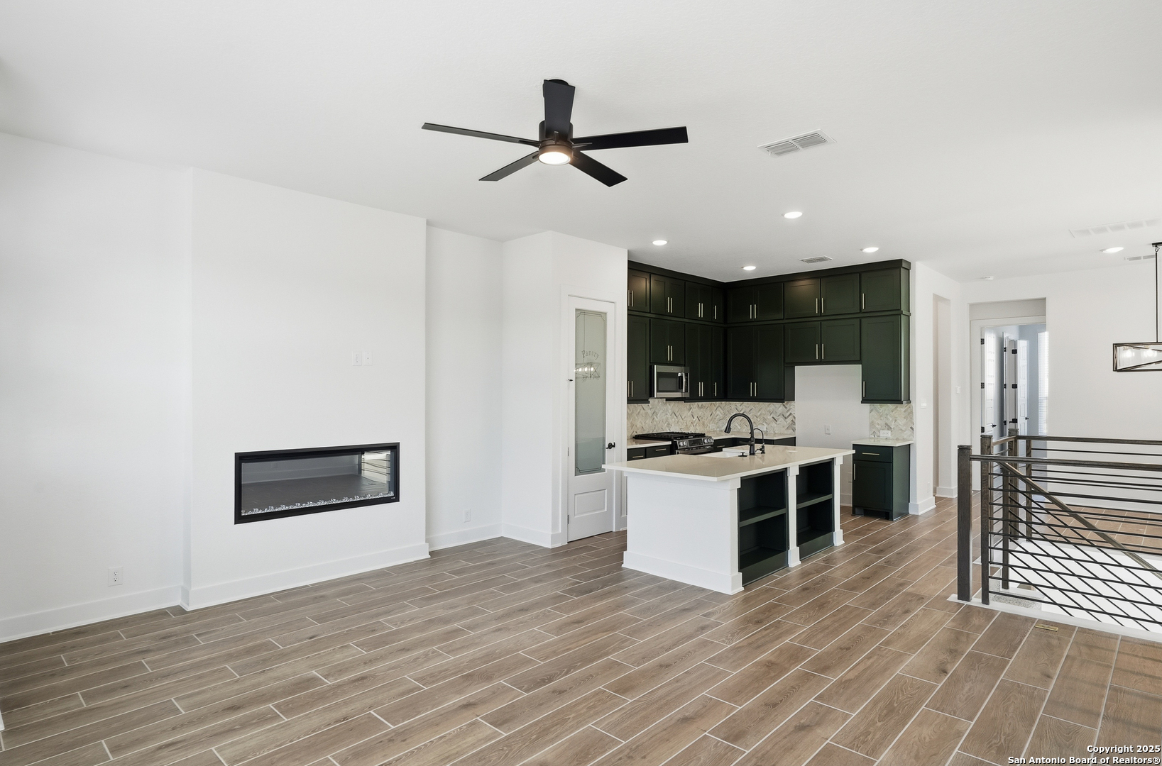 20675 Huebner Road, Unit 526 San Antonio, TX 78258 - Photo 10 of 45 a kitchen with stainless steel appliances a stove and a refrigerator