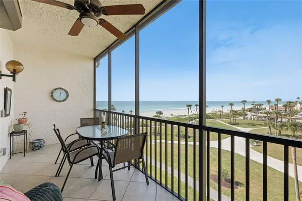 a view of a balcony dining area