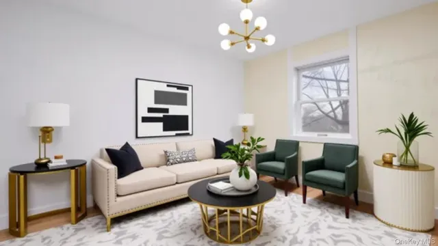 a living room with furniture a chandelier and a potted plant