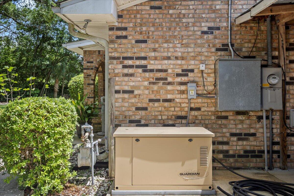 295 Garden Street Crestview, FL 32536 - Photo 30 of 33 a bathroom with a sink and a mirror