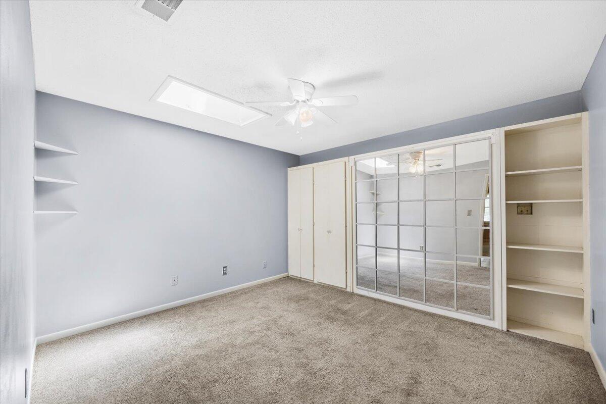 295 Garden Street Crestview, FL 32536 - Photo 7 of 33 a view of an empty room with a window