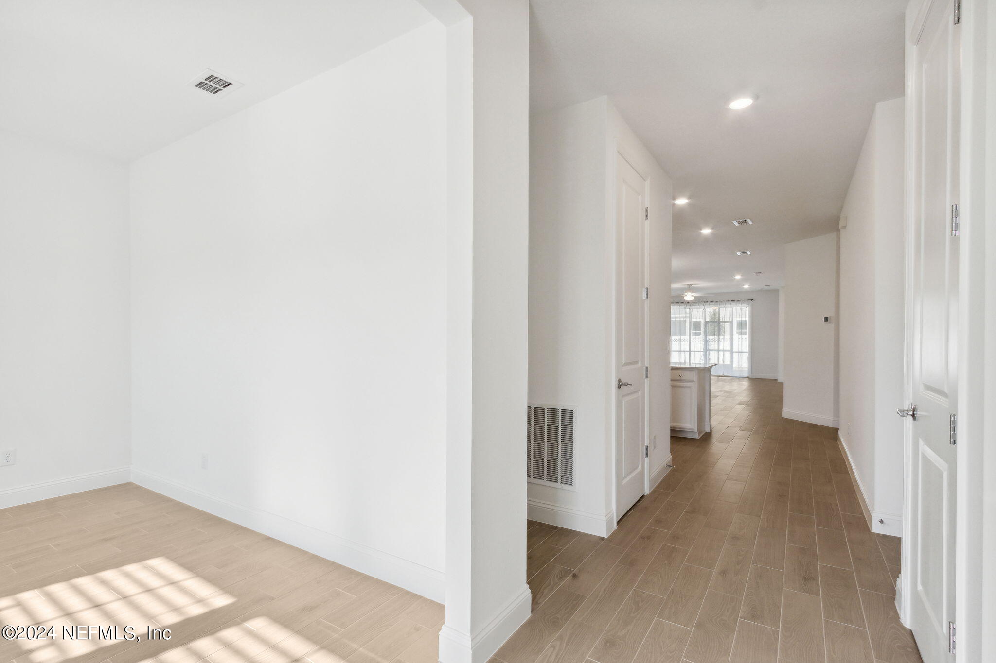 125 Varner Way St. Augustine, FL 32092 - Photo 11 of 87 a view of hallway with wooden floor