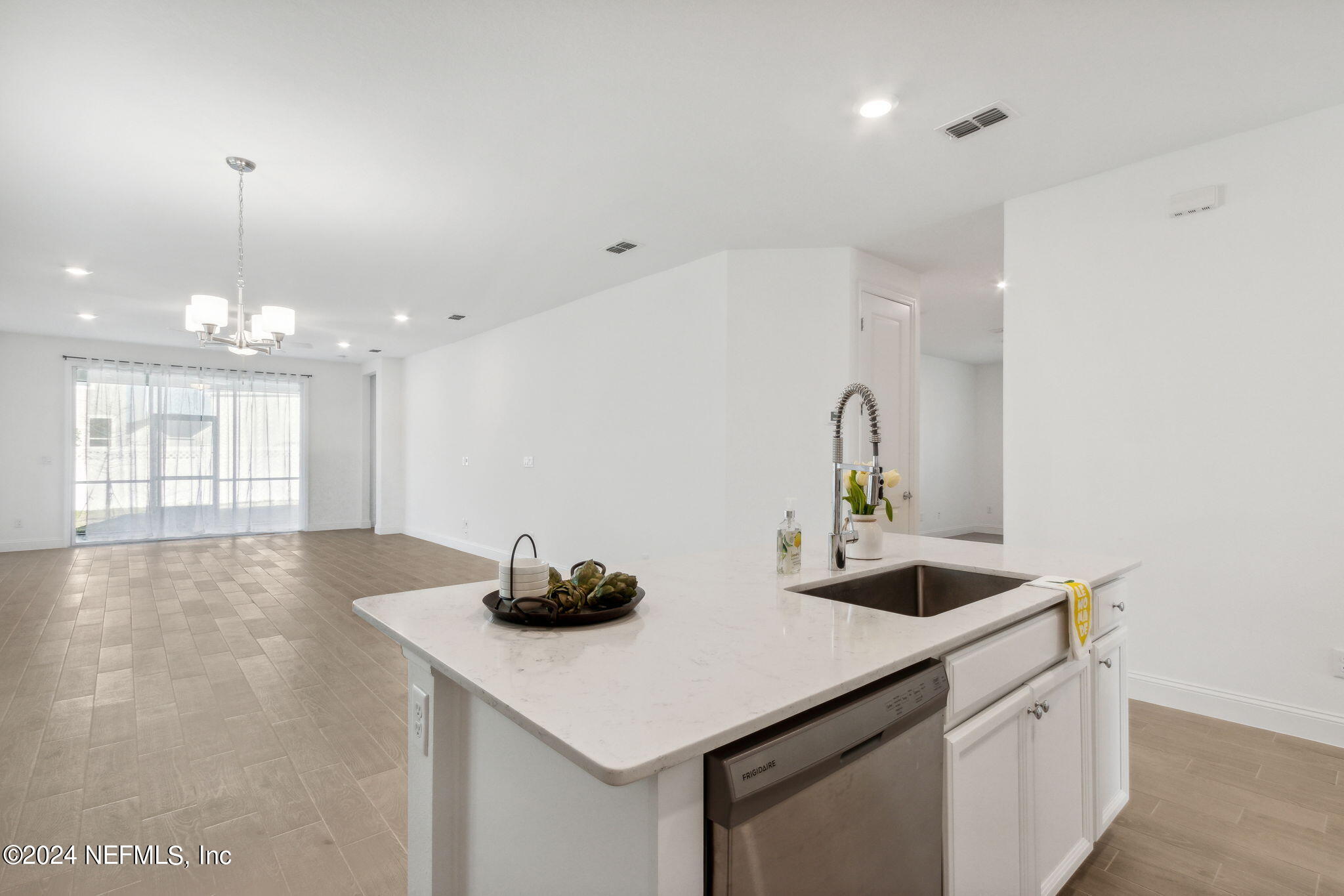 125 Varner Way St. Augustine, FL 32092 - Photo 15 of 87 a kitchen with stainless steel appliances a sink and a stove