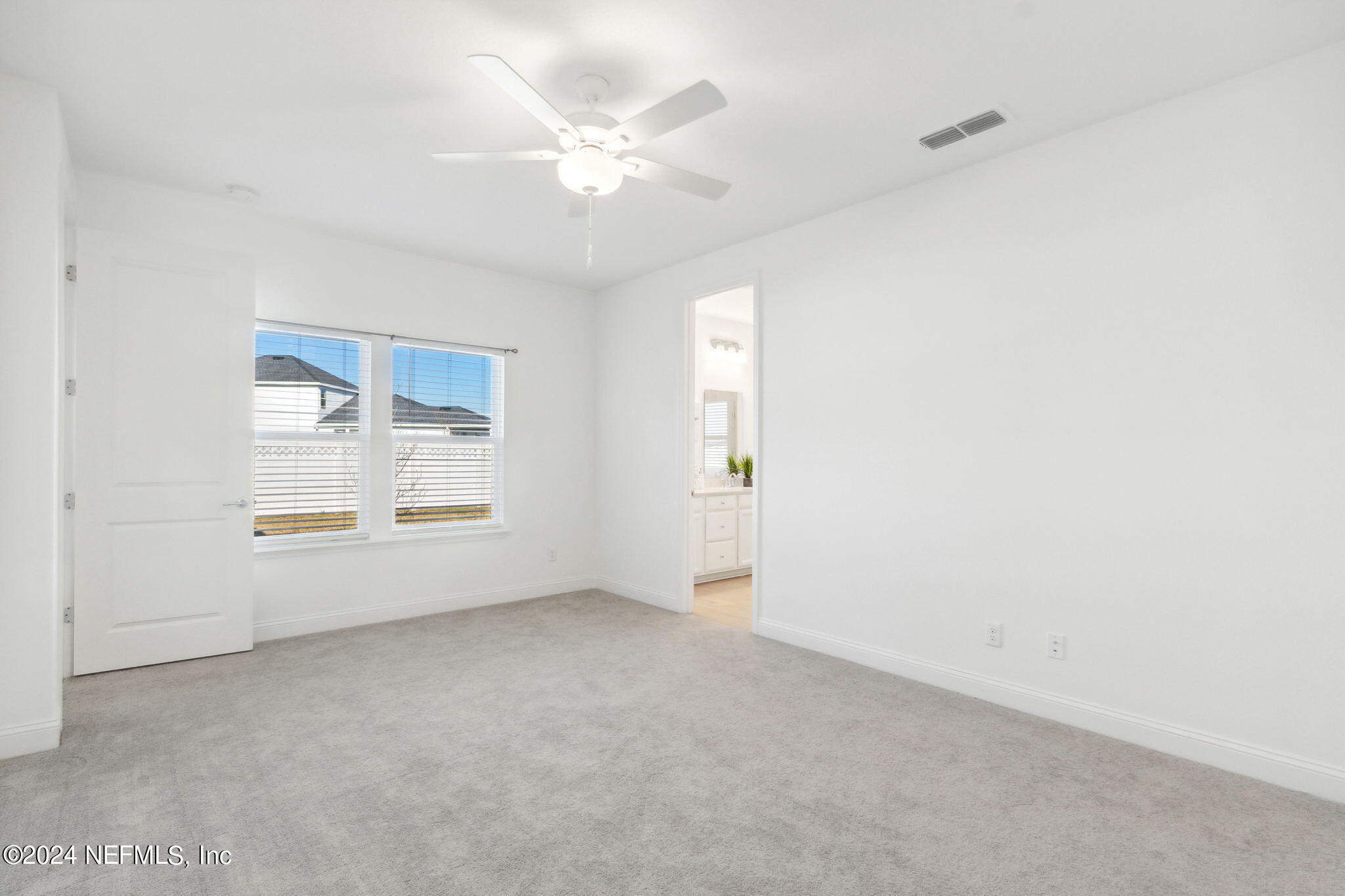 125 Varner Way St. Augustine, FL 32092 - Photo 26 of 87 a view of an empty room with a window