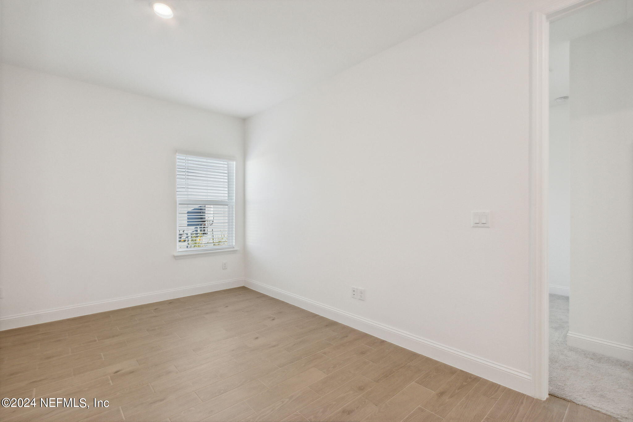 125 Varner Way St. Augustine, FL 32092 - Photo 31 of 87 a view of an empty room with a window