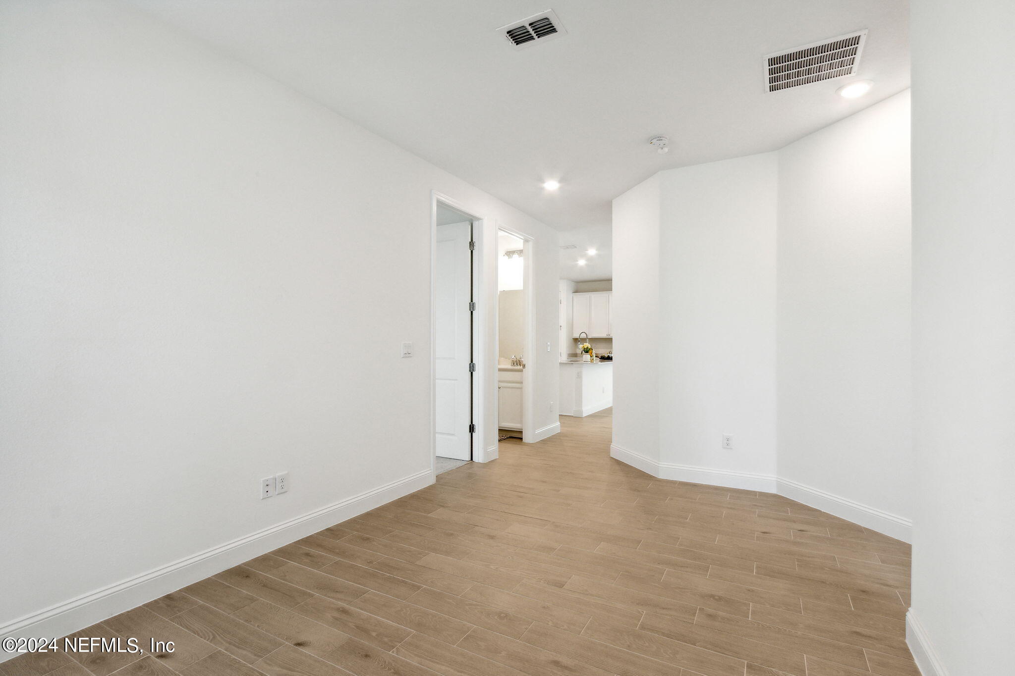 125 Varner Way St. Augustine, FL 32092 - Photo 32 of 87 a view of a big room with wooden floor