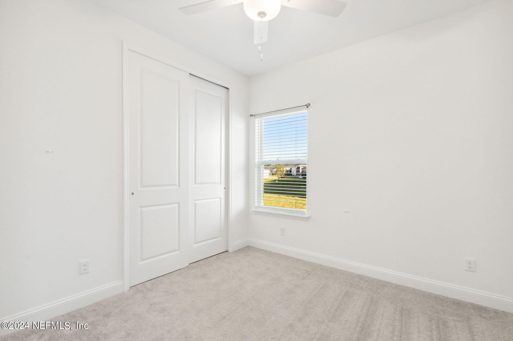 125 Varner Way St. Augustine, FL 32092 - Photo 36 of 87 a view of an empty room with a window