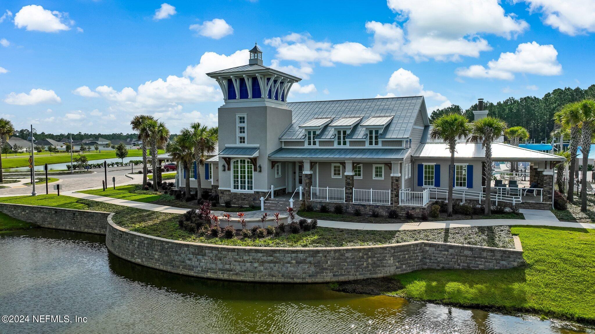 125 Varner Way St. Augustine, FL 32092 - Photo 56 of 87 a view of a house with swimming pool and a yard