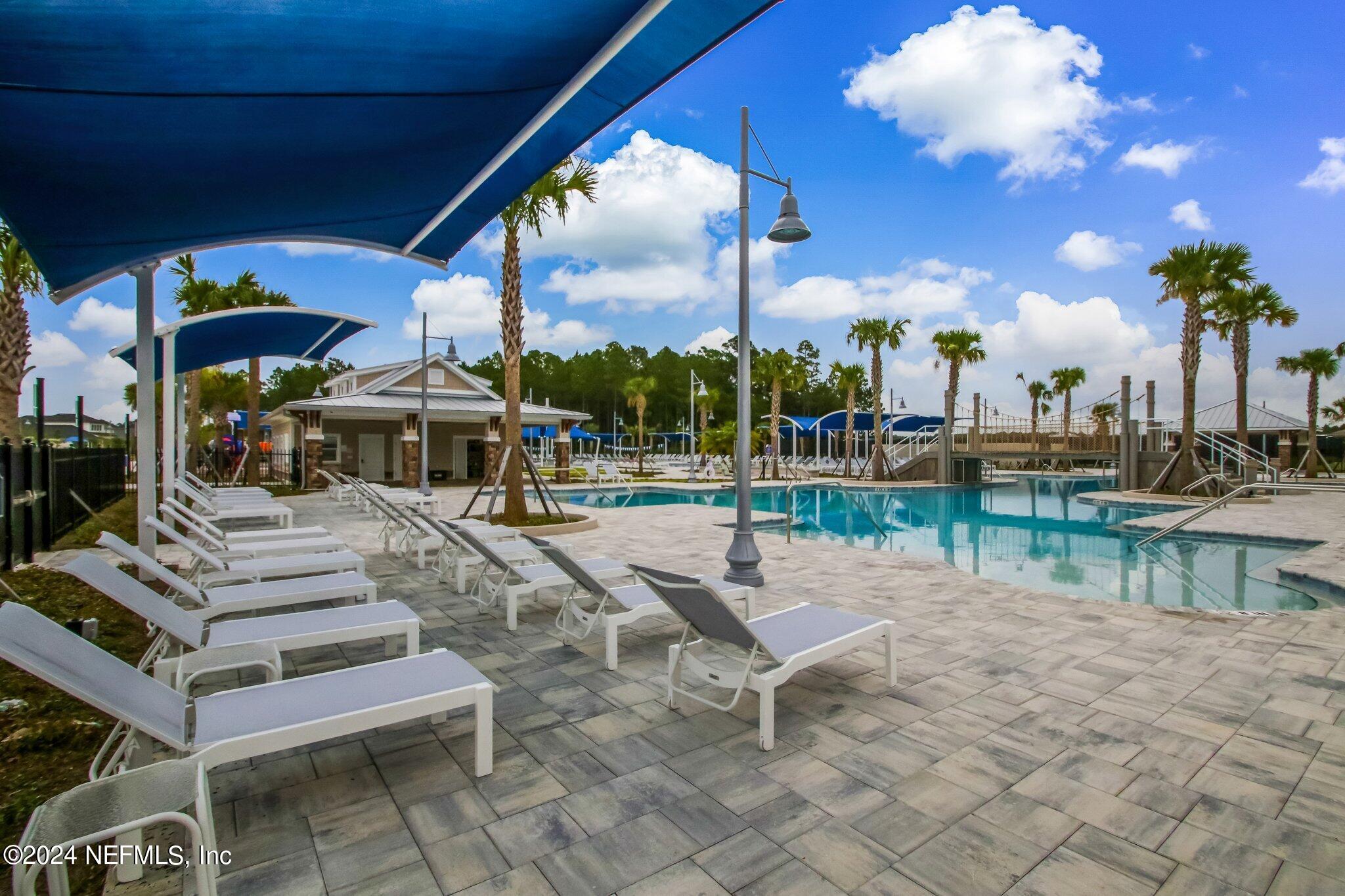 125 Varner Way St. Augustine, FL 32092 - Photo 74 of 87 a view of a patio with swimming pool