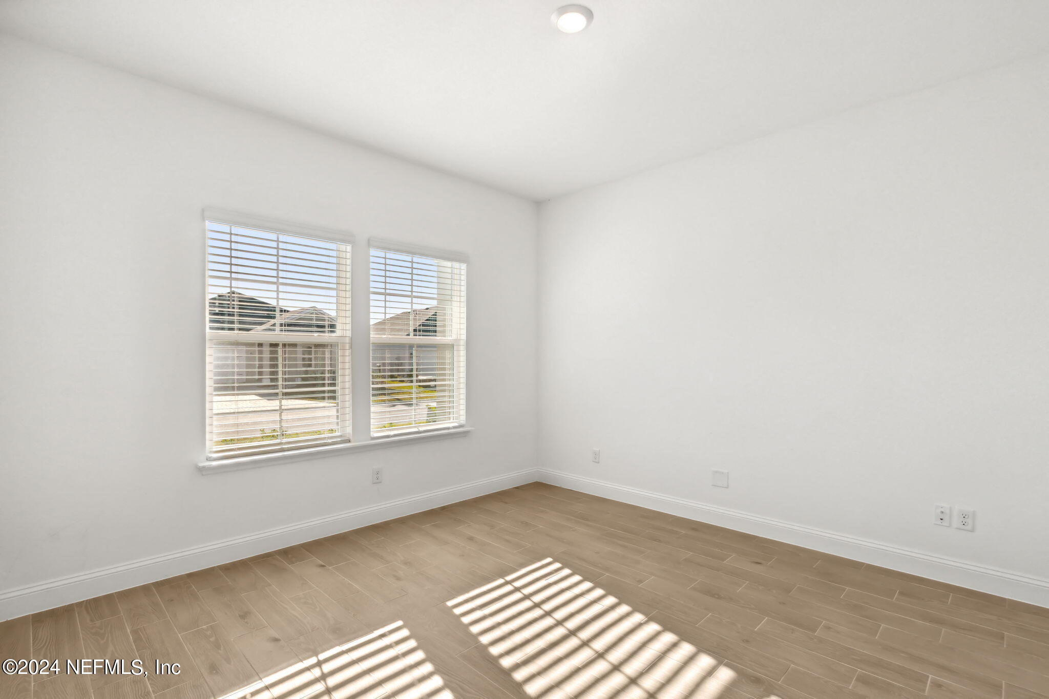 125 Varner Way St. Augustine, FL 32092 - Photo 8 of 87 a view of an empty room with a window