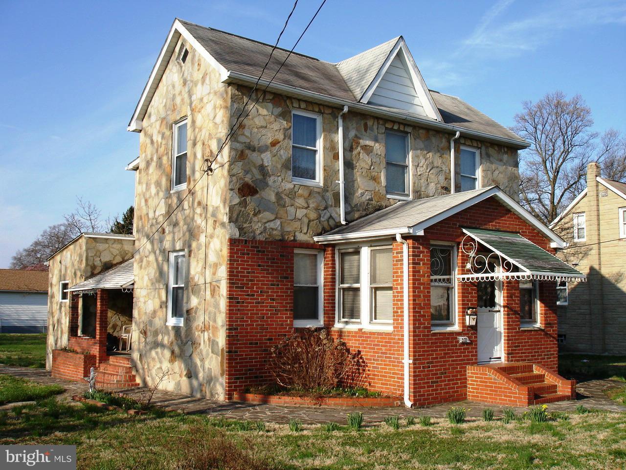 373 Nicholson Road Baltimore, MD 21221 - Photo 1 of 25 front view of a house with a yard