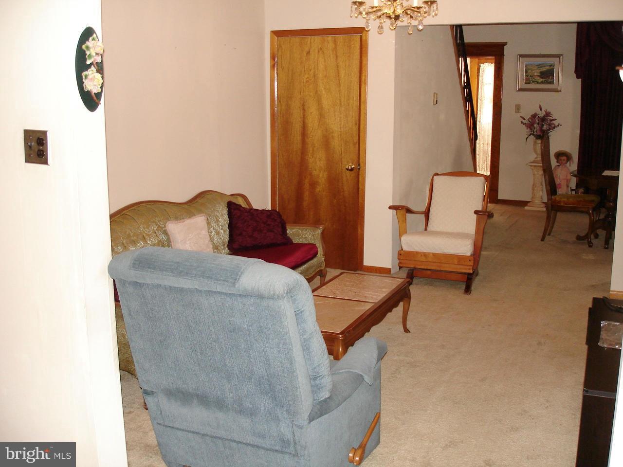 373 Nicholson Road Baltimore, MD 21221 - Photo 17 of 25 a living room with furniture and a window