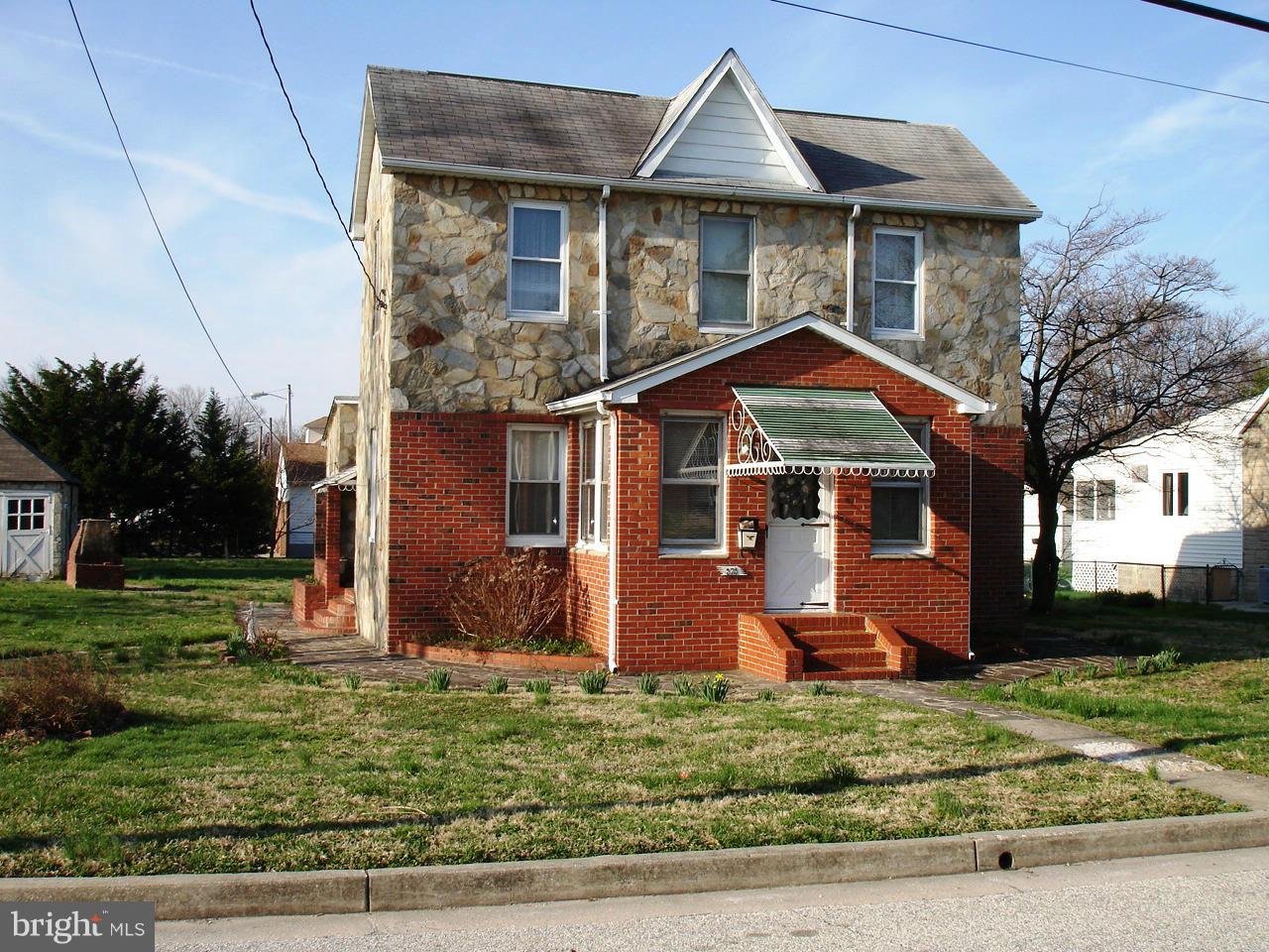 373 Nicholson Road Baltimore, MD 21221 - Photo 21 of 25 a front view of a house with garden