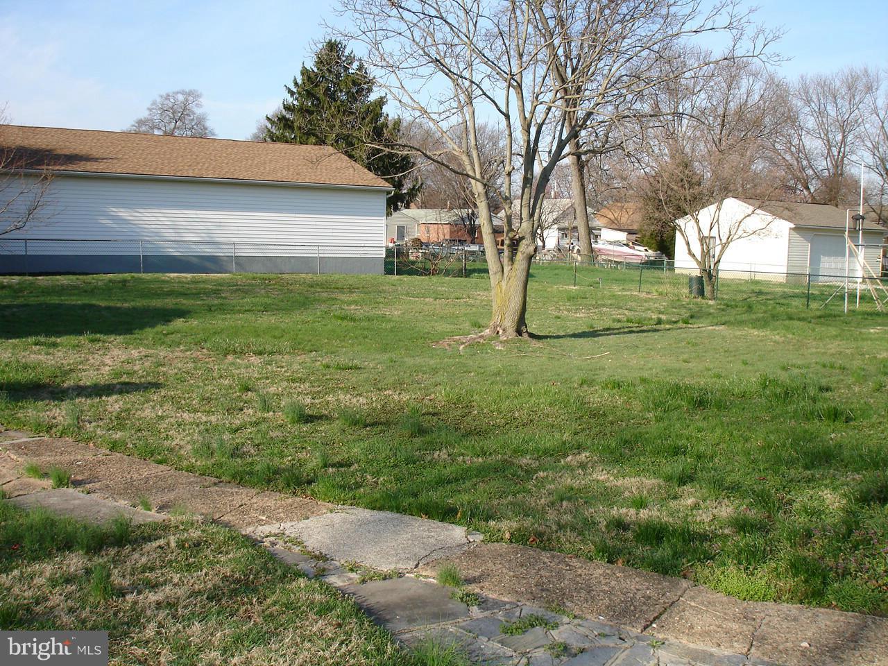 373 Nicholson Road Baltimore, MD 21221 - Photo 23 of 25 a view of a house with a yard